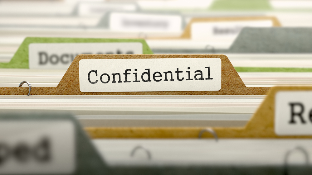 Confidential Concept. Colored Document Folders Sorted for Catalog. Closeup View. Selective Focus. Confidential Concept. Colored Document Folders Sorted for Catalog. Closeup View. Selective Focus.